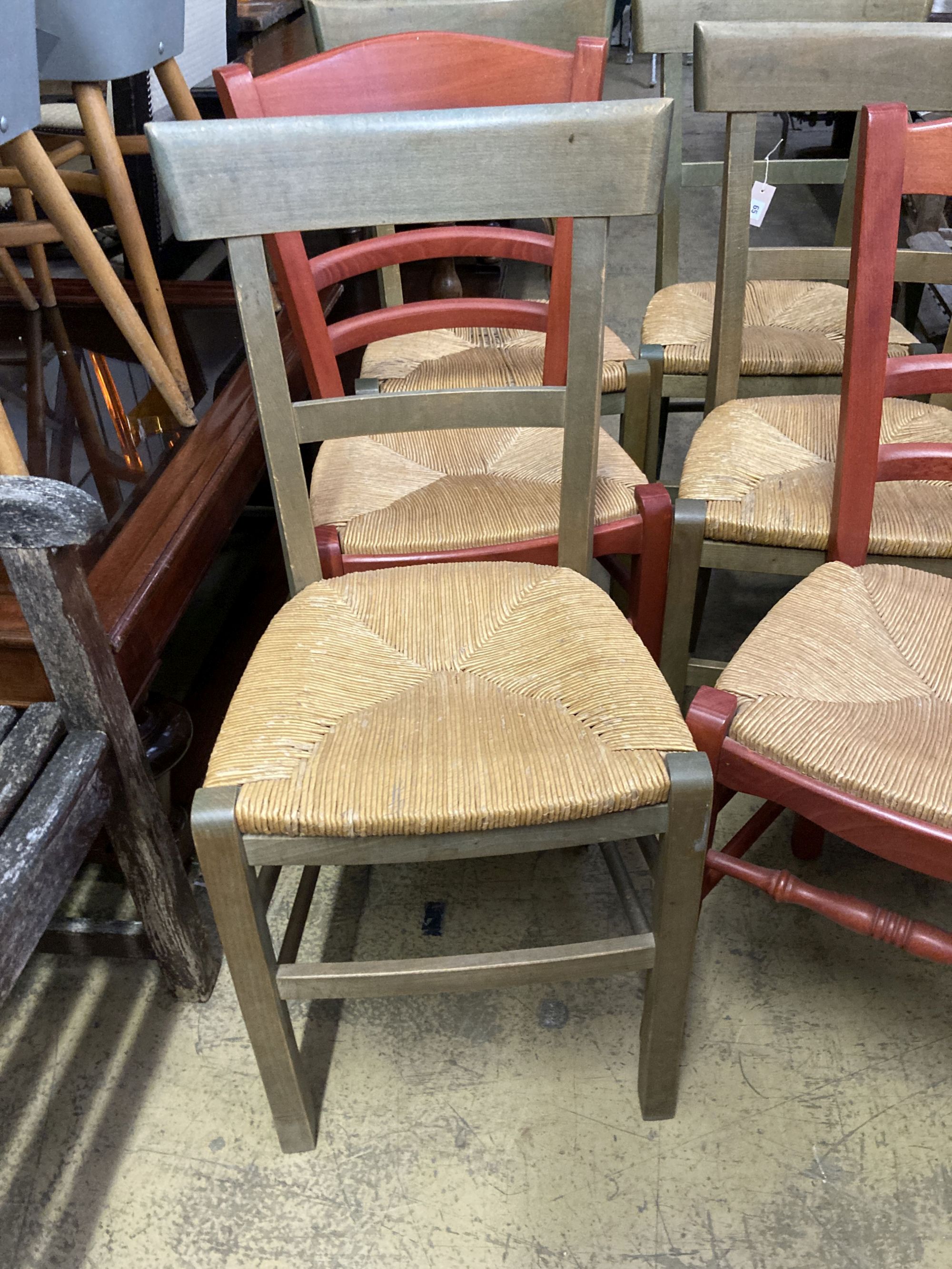 Six (four plus two) French stained beech rush seated dining chairs